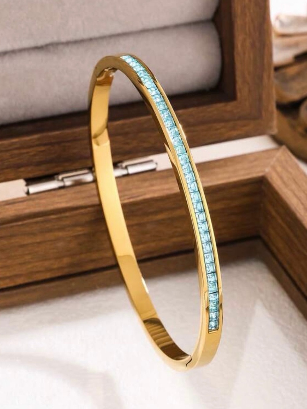 Macy's Gold Bangle Bracelet with Light Blue Stones
